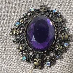 Vintage Purple Gemstone with Skeleton Heads. Halloween? WA500